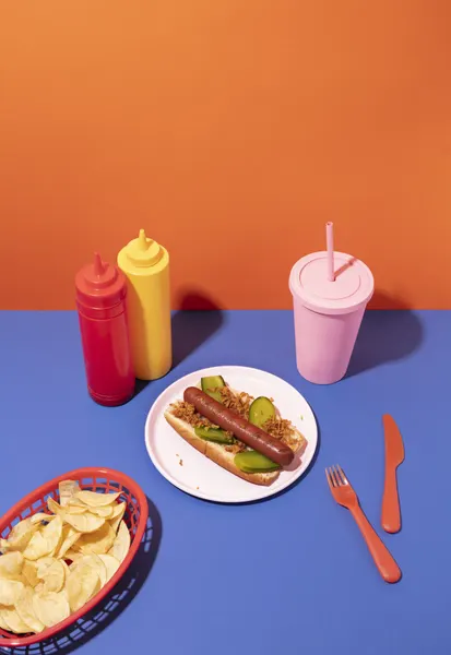 Vibrant Hot Dog Meal by Julia Ramiro