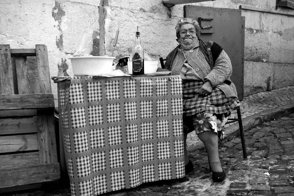 Old Woman Street Vendor by Fernando Alves