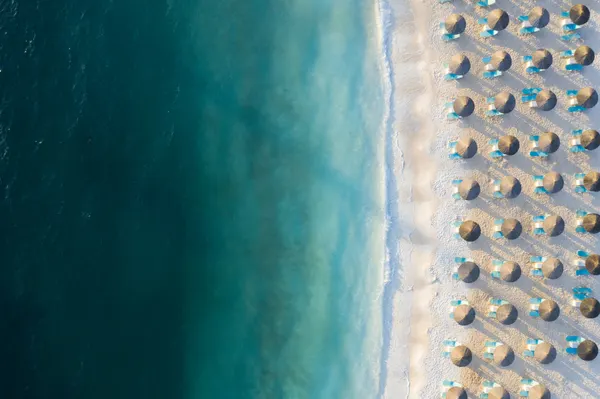 Turquoise Beach Umbrellas by Eros Erika