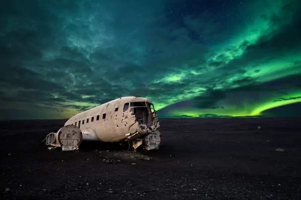 Aurora Over Plane Wreck by Carlos Resende