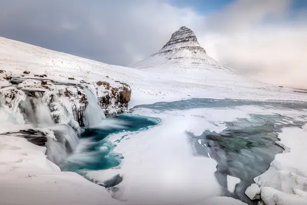 Kirkjufell Winter Waterfall by Curdin Wüthrich