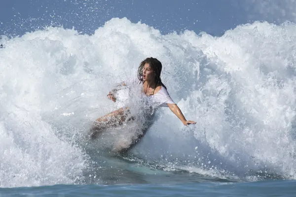 Woman Surfing Wave by Yuval