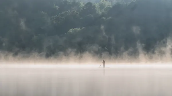 Misty Morning Paddle by Yu Mao