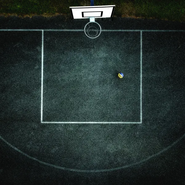 Lone Basketball Court by Dusan Ignac