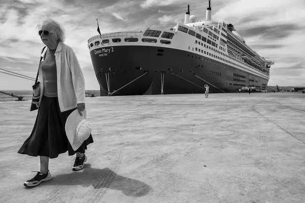 Elderly Traveler Big Ship by Luis Sarmento