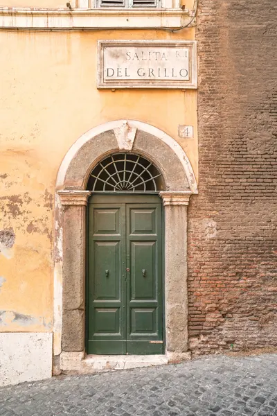 Old Roman Green Door by Henrike Schenk