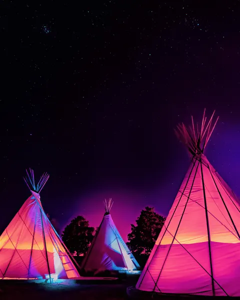 Vaporwave Teepees Glowing at Night Under Stars In Marfa Texas by Tom Windeknecht