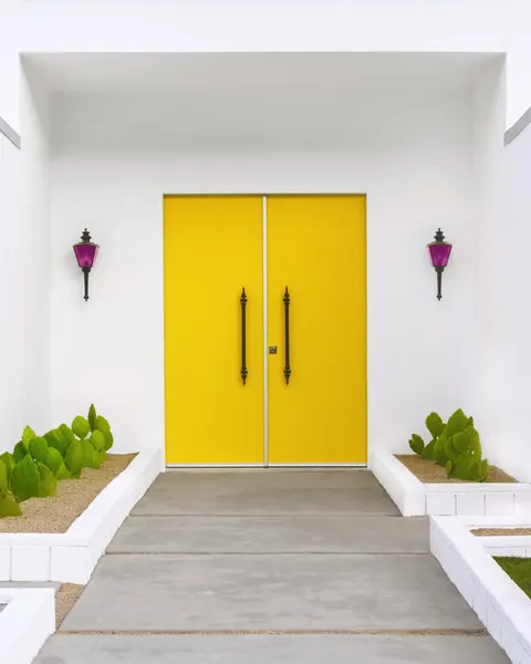 Yellow Doors in Palm Springs by Tom Windeknecht