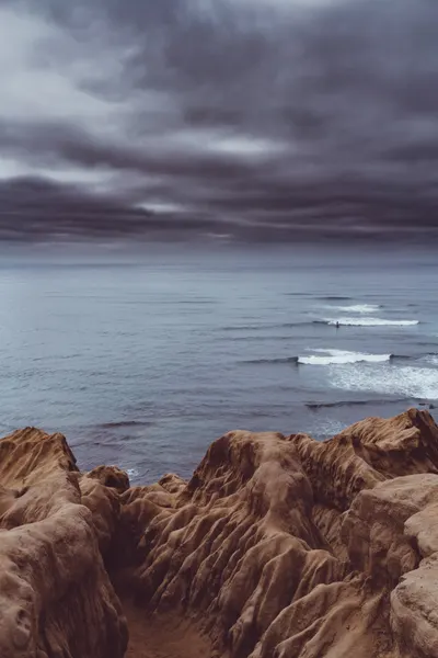 Moody Ocean Cliffs by Bethany Young