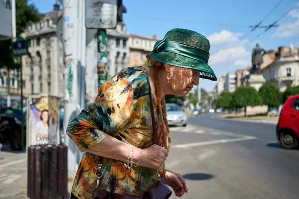 Woman in Green Hat by Denis Malciu