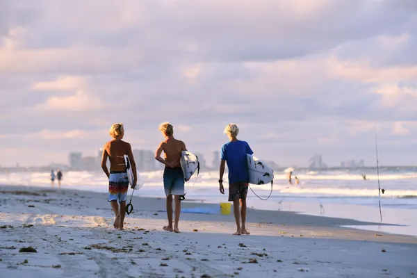 Golden Hour Surfers by Victor Zhang