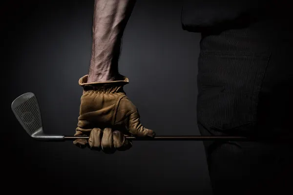 Golfer's Strong Grip by Jan Scheunders