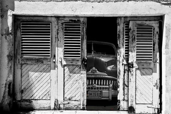 Hidden Vintage Car Garage by LARRY BUTTERWORTH