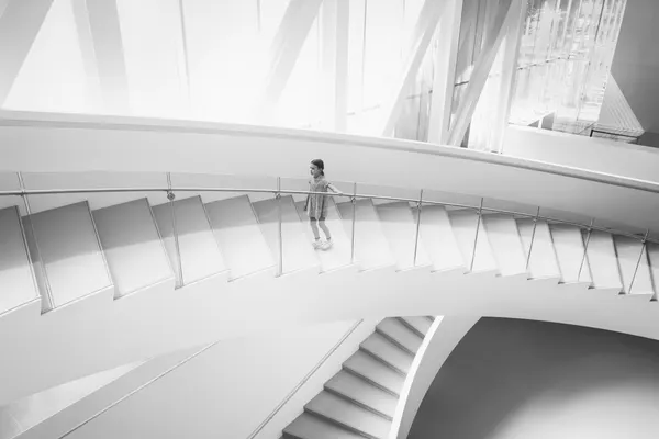 Girl on Modern Stairs by Michel Groleau