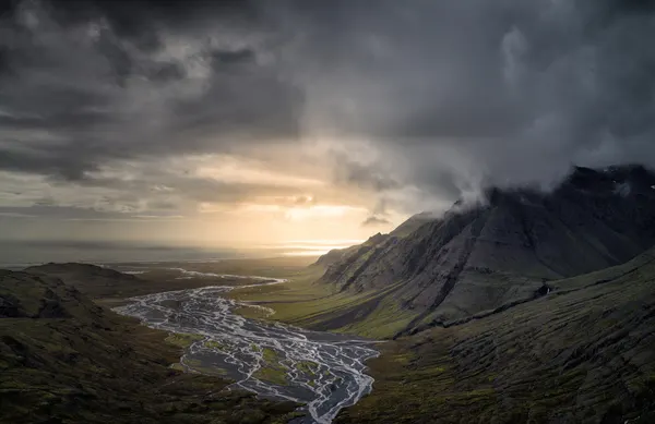 Sunlit Braided River Valley by Ronny Olsson
