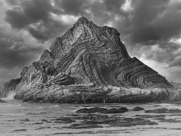 Dramatic Folded Ocean Rock by Hanna Röwekamp