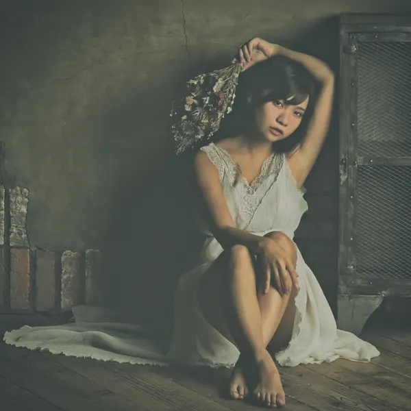 Contemplative Woman with Flowers by Blue_Rose
