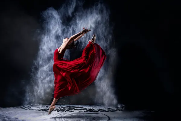 Red Dress Dance Leap by Petr Kleiner