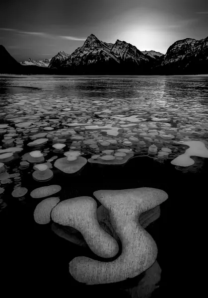 Mountain Lake Ice Bubbles by Jiahong Zeng