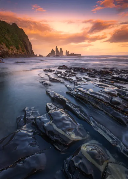 Sunset Sea Stacks by Jianping Yang