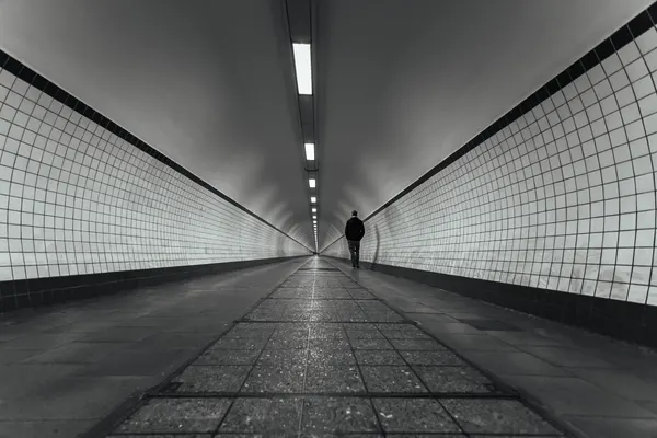 Lone Walk Through Tunnel by iuliana pasca