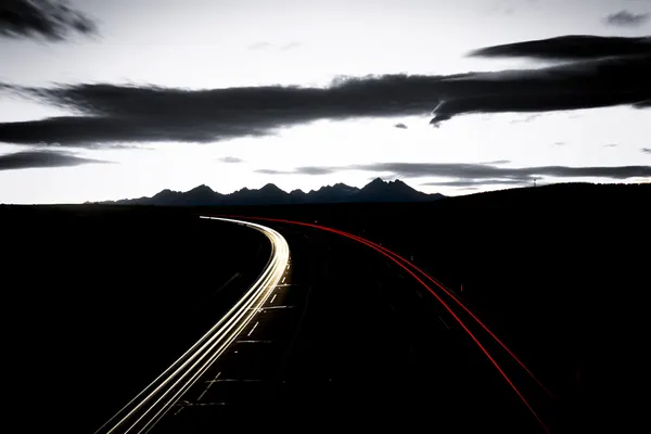 Night Highway Light Trails by Dusan Ignac