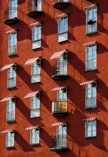 Striped Awnings Facade by Karim Al Thahaby
