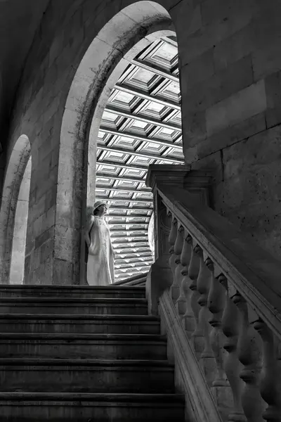Figure On Grand Staircase by Michel Groleau