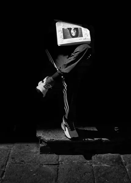 Mysterious Newspaper Reader by Luca Domenichi
