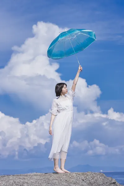 Woman And Sky Umbrella by SHIMA