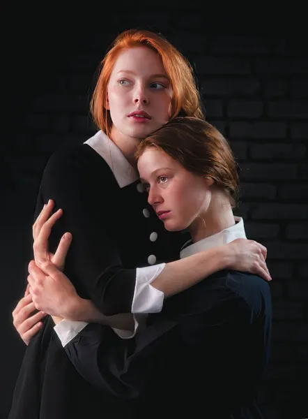 Sisters' Comforting Embrace by Tali Stein