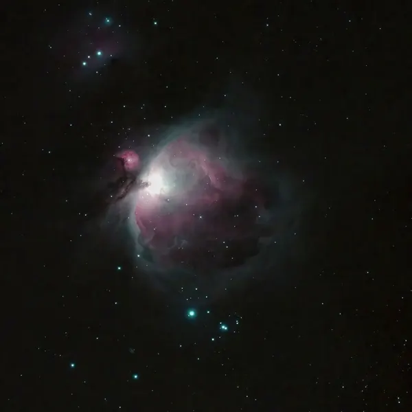 Orion Nebula's Cosmic Glow by Paul Hsi