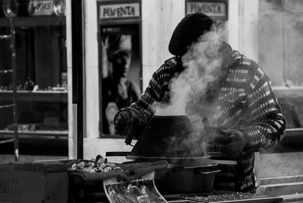 Roasted Chestnuts Vendor by Fernando Alves