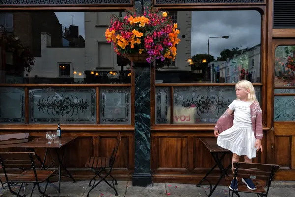 Little Girl Cafe Street by Josefina Melo