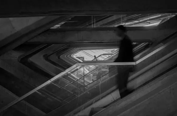 Blurred Escalator Ascent by Michel Groleau