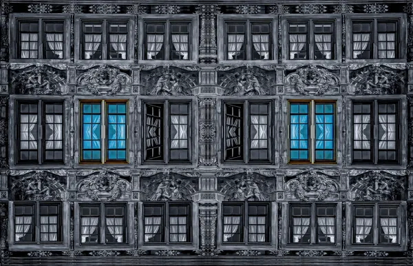 Ornate Blue Window Facade by Miro Susta