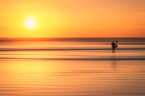 Golden Sunset Paddle by Pablo Mauriz