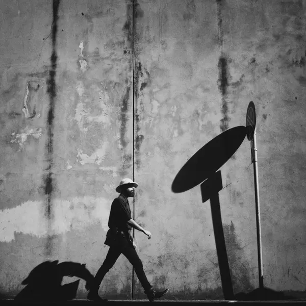Man and Long Shadow by Selaru Ovidiu