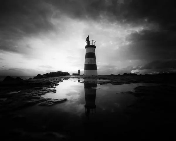Lighthouse Reflection at Dusk by Marco Faria