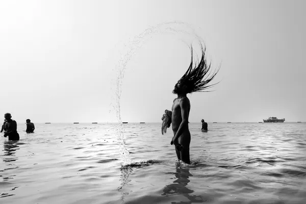 Holy Man's Water Ritual by Prithul Das