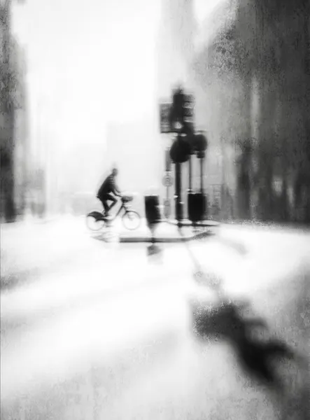 Urban Shadow Cyclist by Amer Jassim