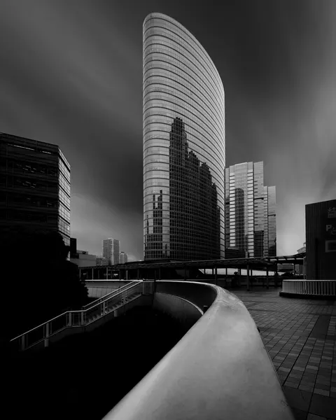 Sleek Cityscape Reflection by Yasuhiro Takachi