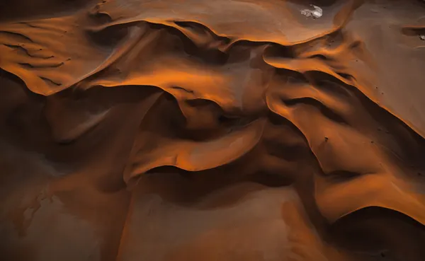 Flowing Orange Dunes by Isam Telhami