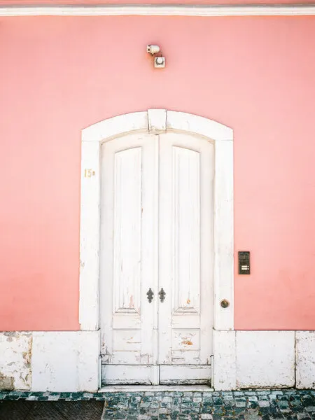 The white door Lisbon, wall art by Raisa Zwart