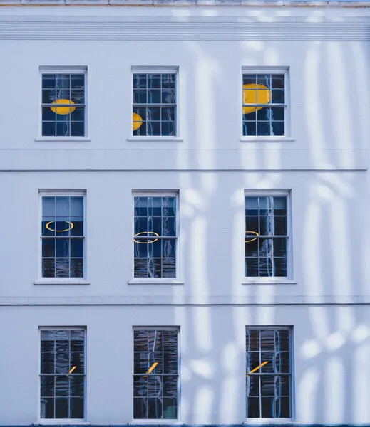 Yellow Shapes White Facade, wall art by Yu Mao