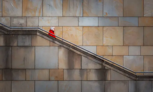 Red Figure on Stairs, wall art by Hans Günther