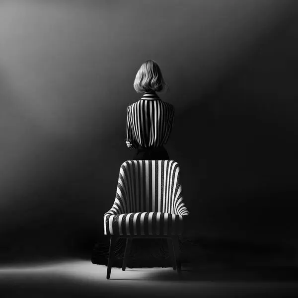 Striped Woman And Chair, wall art by Marcin Michalowski