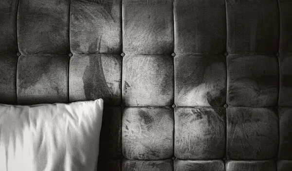 Dark Tufted Headboard, wall art by Martin Wong