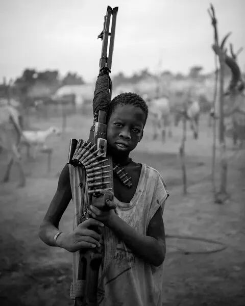 African Boy With Rifle, wall art by Max Vere-Hodge