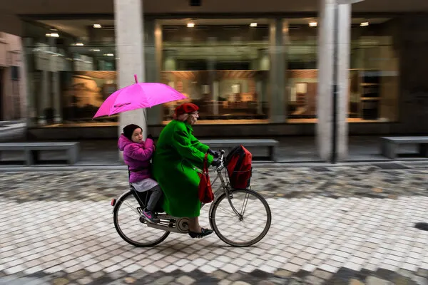 Pink Umbrella Bike Ride, wall art by Luca Domenichi